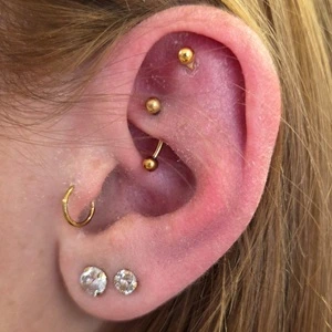 Nordik Piercing: piercings lobe, piercing tragus, piercing rook et piercing flat