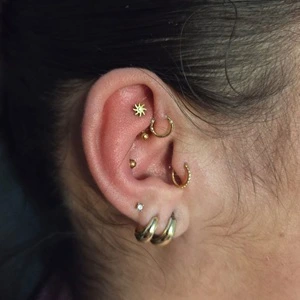 Nordik Piercing: piercing anti-helix, piercing rook, piercing conch, piercings lobe et piercing tragus