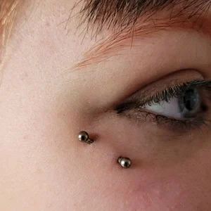 Piercing anti-arcade effectué par Nordik Piercing