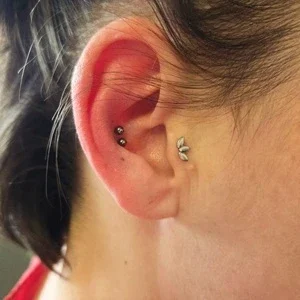 Nordik Piercing: double piercing conch