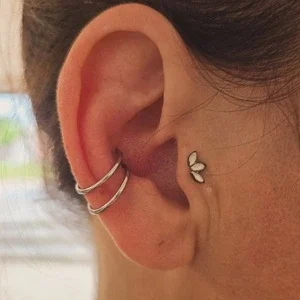 Nordik Piercing: double piercing conch et piercing tragus